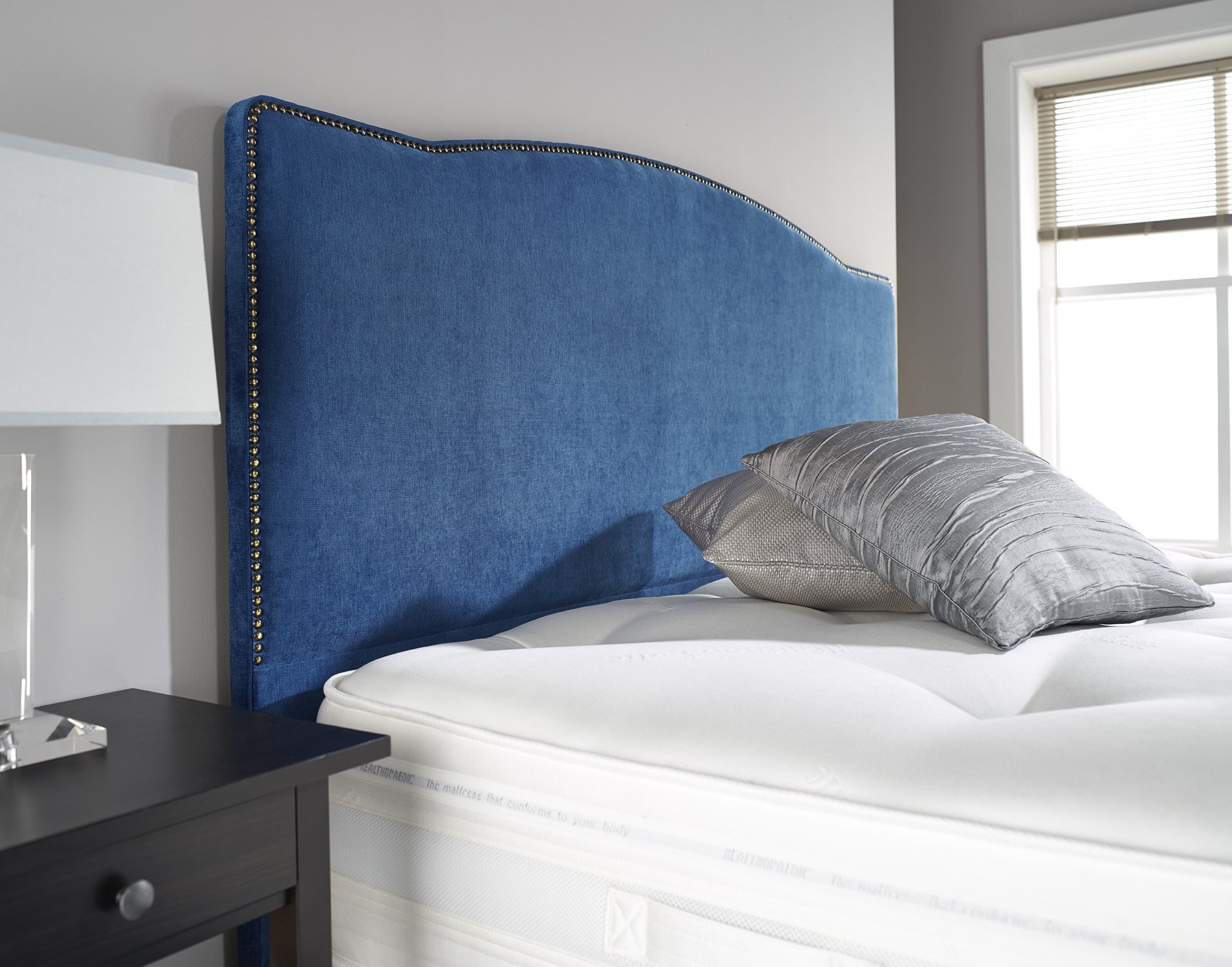 Curve Floor Standing Studded Headboard Furniture World